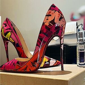 Christian Louboutin Women’s “SO KATE” patent leather pumps.